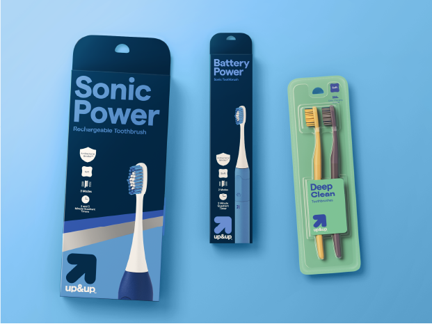 An up&up Sonic Power toothbrush, a battery-powered toothbrush and a pack of two manual toothbrushes.