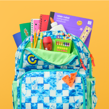 A backpack filled with school supplies.