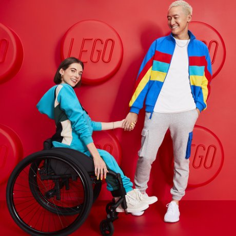 a man and a woman in a wheelchair