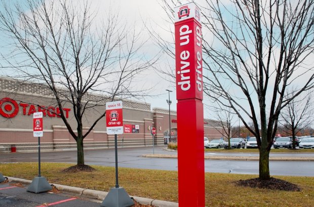 a red sign in front of a building