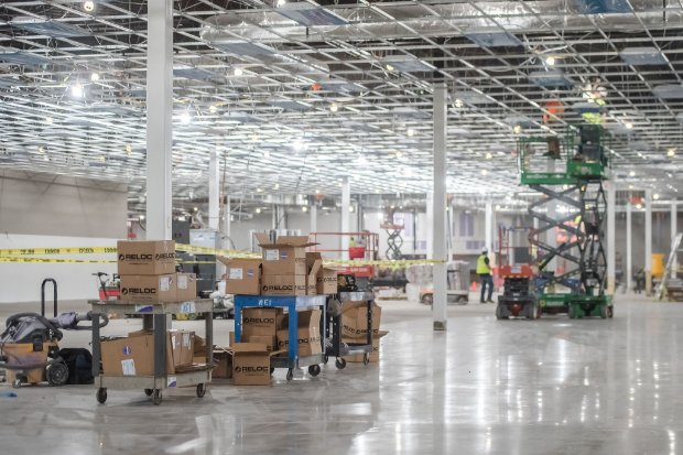 a warehouse with boxes and machinery