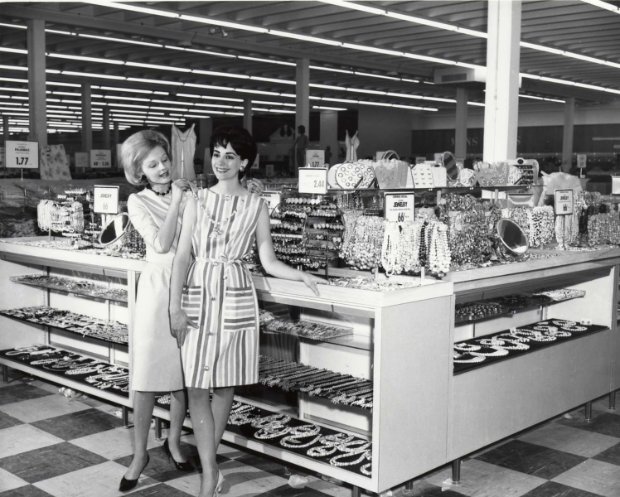 two women standing in a store