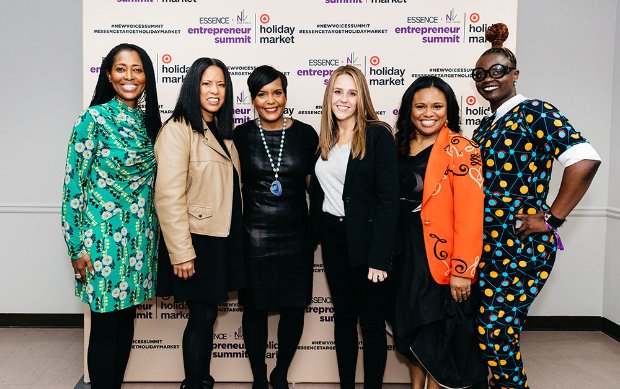 a group of women posing for a photo