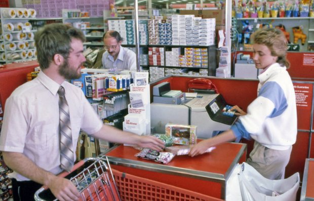 a man and a woman at a store