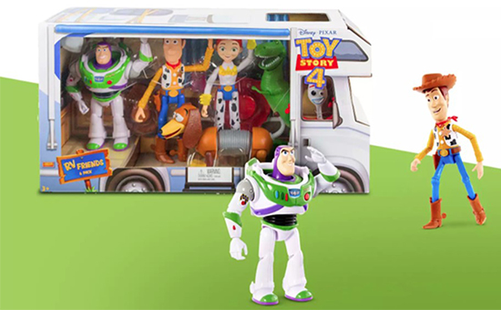 The RV play set package with Woody and Buzz figures posed next to it