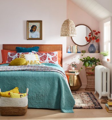 a bedroom with a bed and a basket