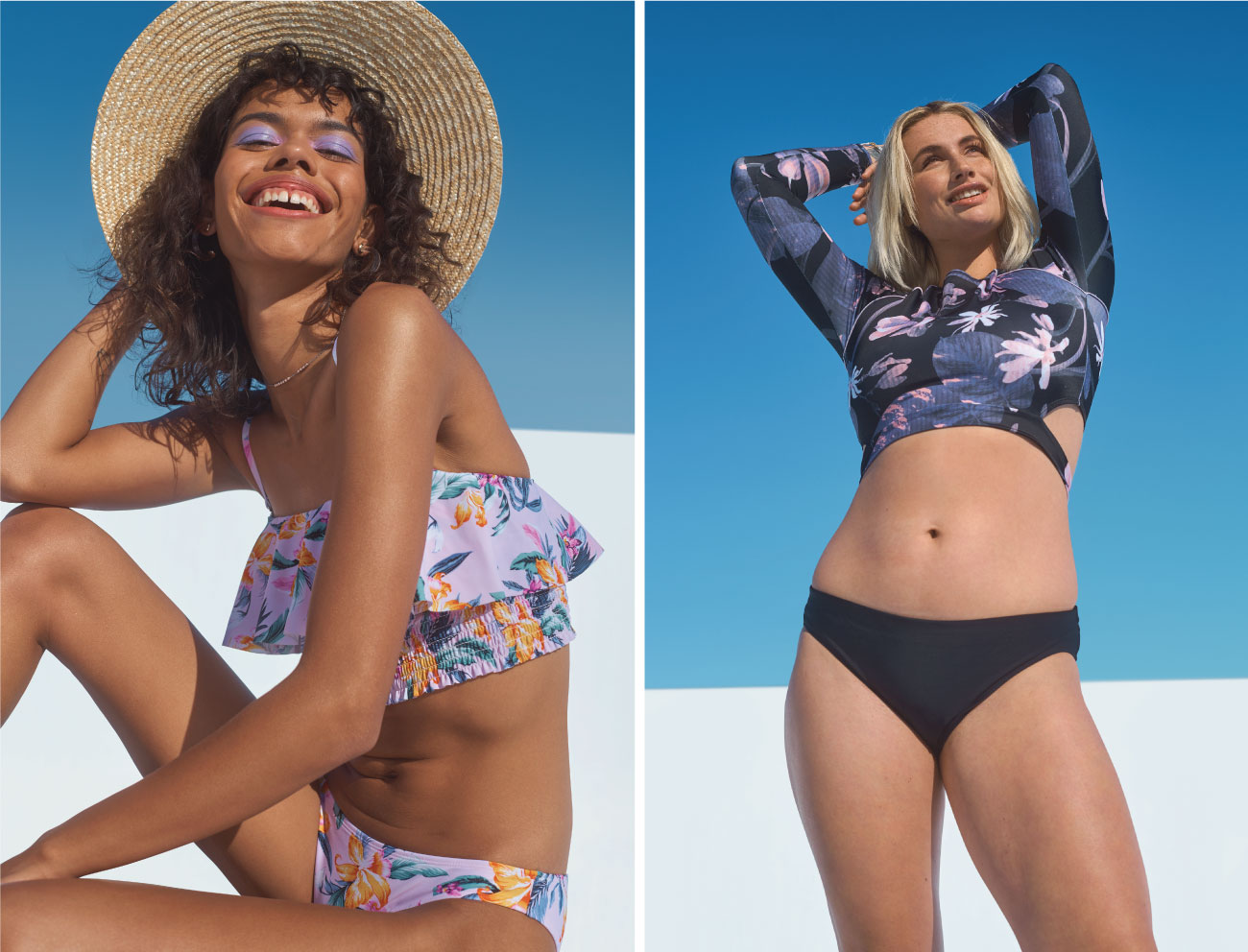 Two women wear floral swim suits, one a ruffled floral bikini and one a long-sleeve floral bikini