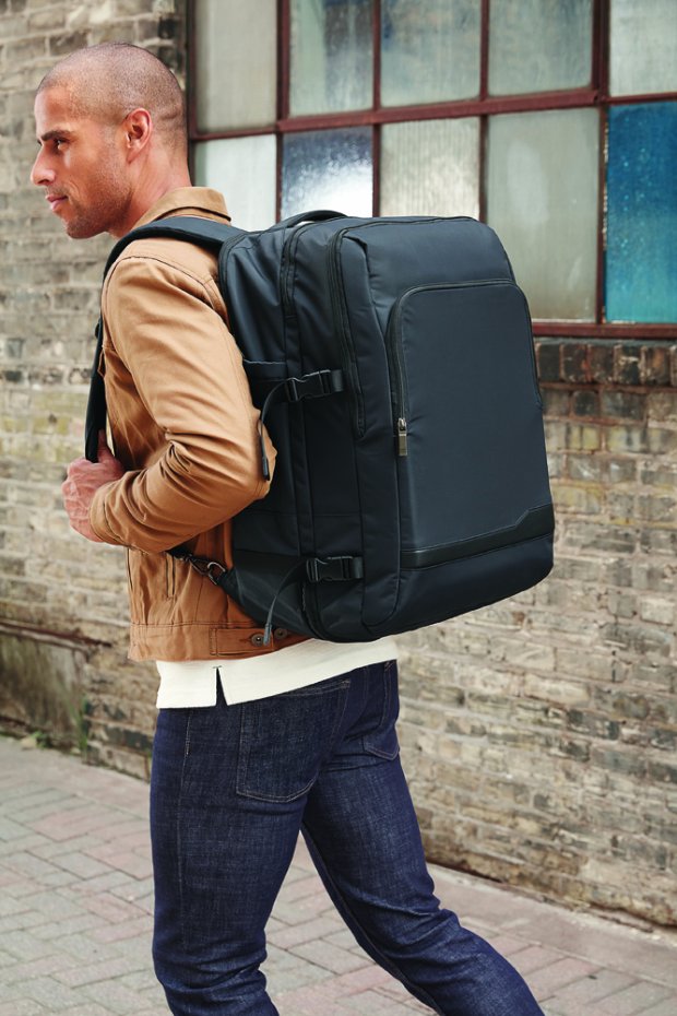 a man carrying a backpack
