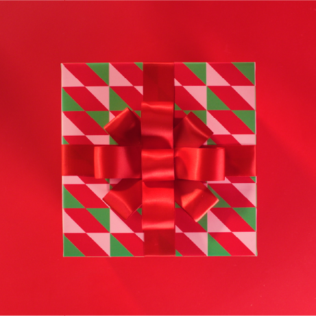 A red graphic with a wrapped present in the center.