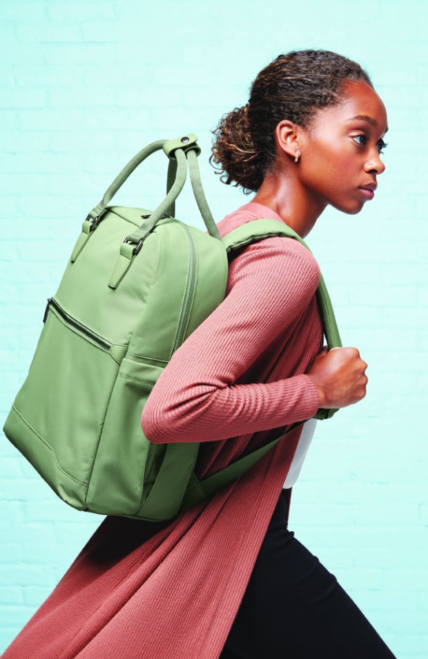 a man carrying a bag