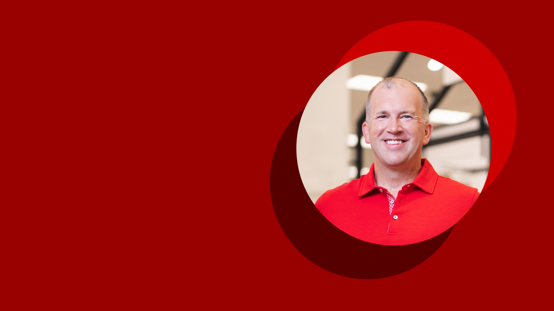 A red banner with a photo of Michael Fiddelke.