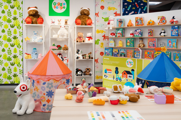 A room filled with shelves and tables full of Gigglescape toys