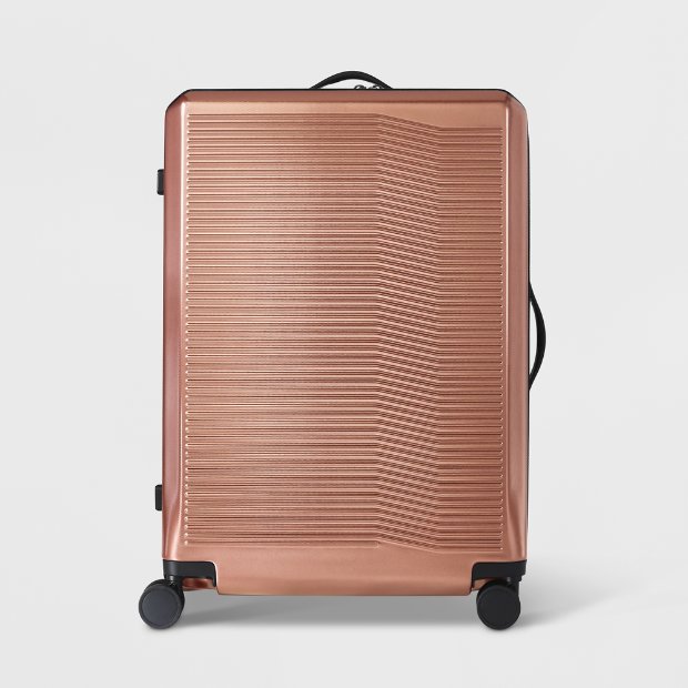 a brown suitcase with wheels