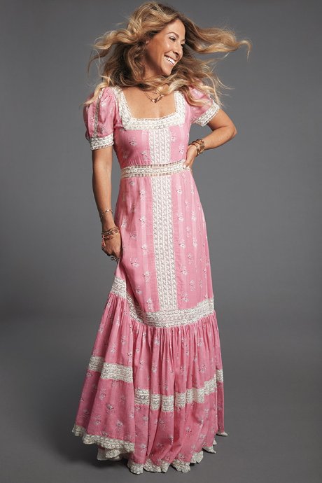 a woman wearing a pink dress