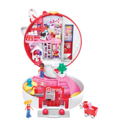 A white background displays a red Target-inspired store playset with a slide, elevator, Bullseye dog, shopping cart and more.