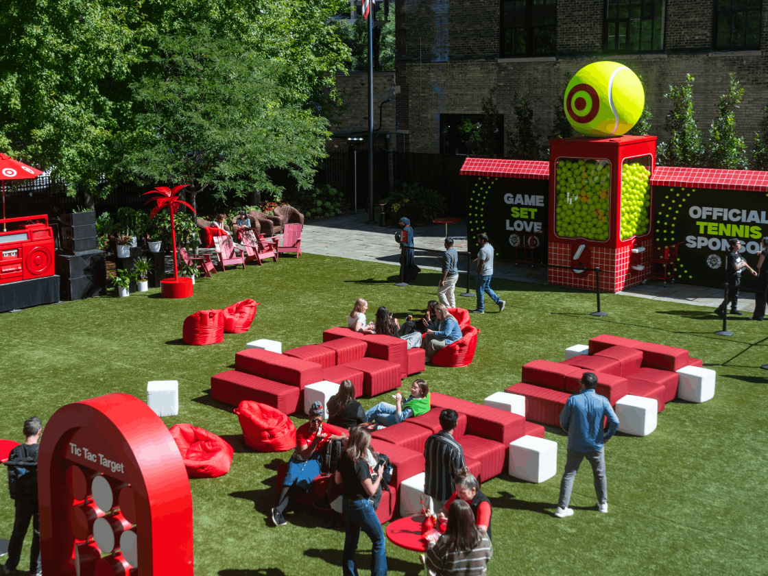 Team members enjoy games and networking outside Target Plaza Commons
