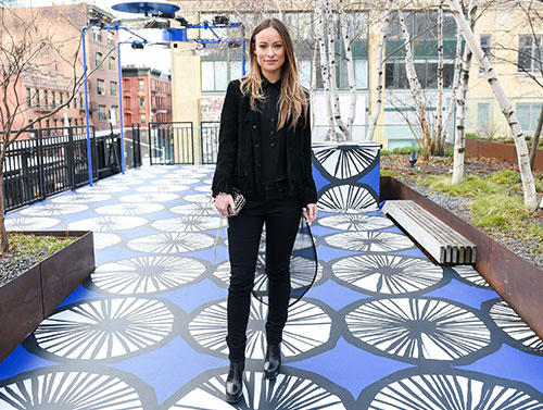 Actress Olivia Wilde poses on one of the Marimekko for Target installations on the High Line in New York City