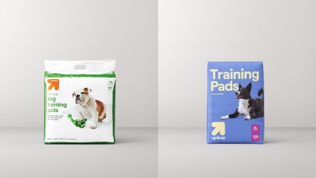 Two images of up&up Pet Training Pads showing previous packaging designs and new packaging designs.