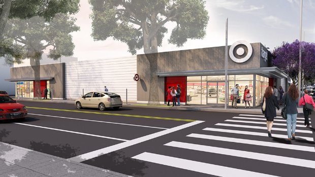 a group of people walking on a crosswalk in front of a building