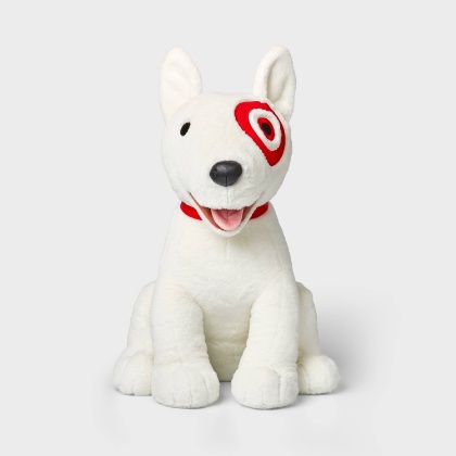 A white background displays a smiling Bullseye dog stuffed animal.