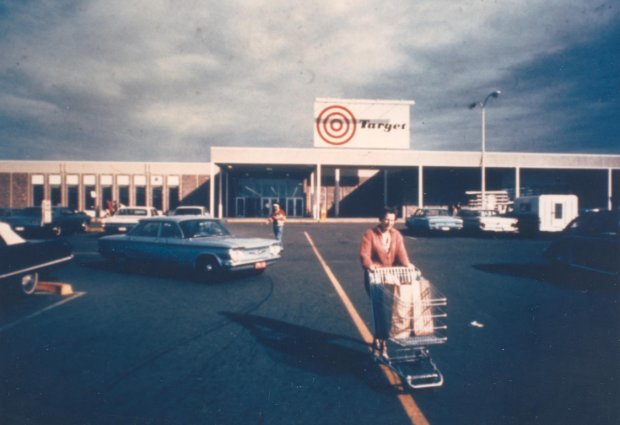 a man carrying a box