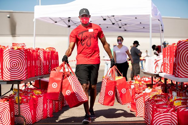 a man holding shopping bags