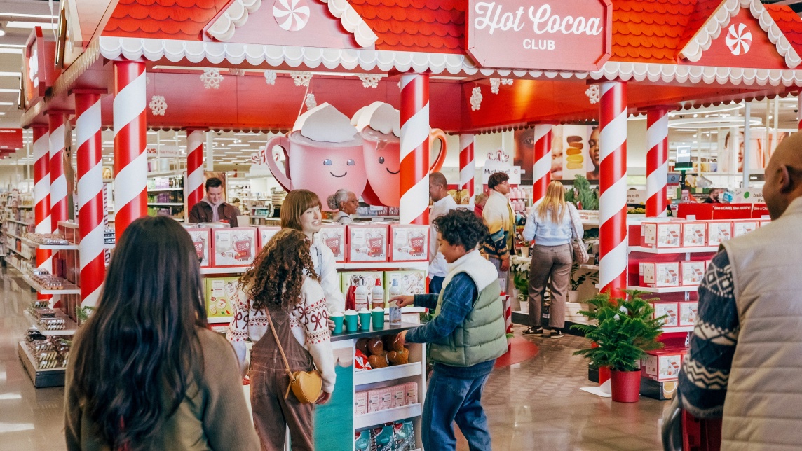 Shoppers mill around in the Hot Cocoa Club in a Target store.