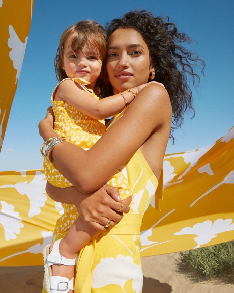 A woman model and child model pose, wearing Diane von Furstenberg for Target collection.