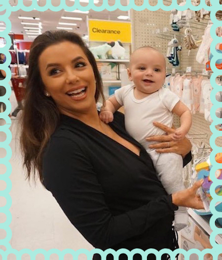 Eva Longoria holds her baby son in a Target aisle