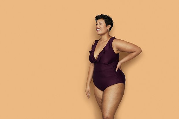 a woman in a purple dress