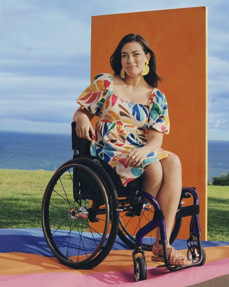 a woman sitting in a wheelchair