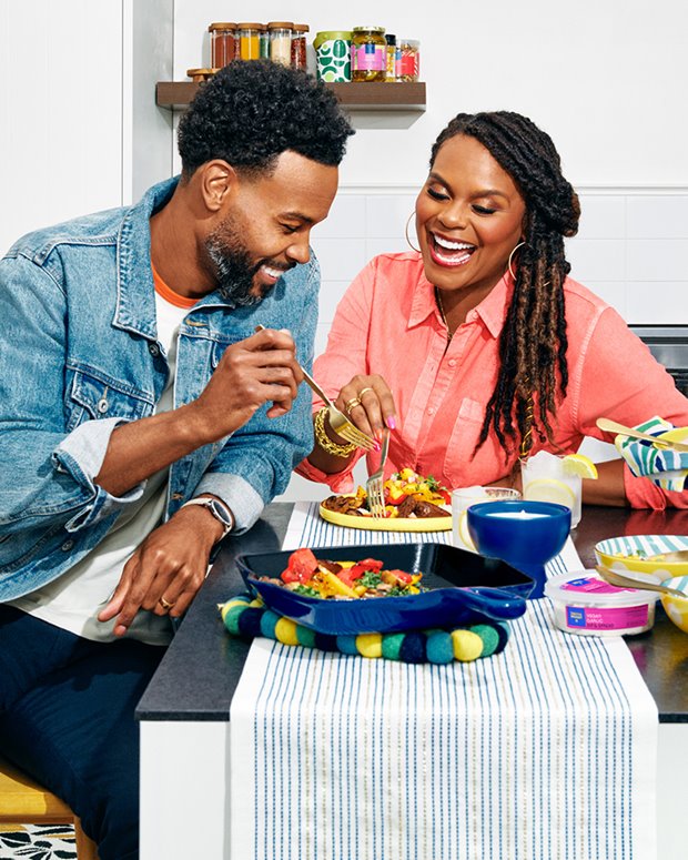 a man and a woman eating food