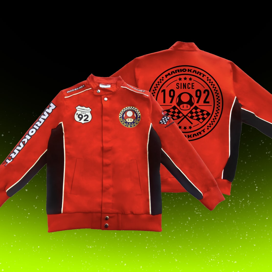 A red Mario Kart–inspired racing jacket shown from the front and back, featuring embroidered patches, “Mario Kart” lettering on the sleeves, and a large “Since 1992” logo on the back.