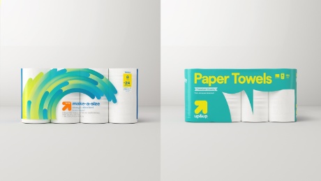 Two images of up&up paper towels showing previous packaging designs and new packaging designs.