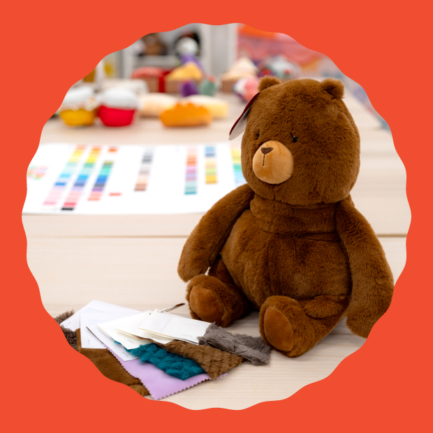 A Gigglescape paper showing the brand’s color schemes next to a plush bear.