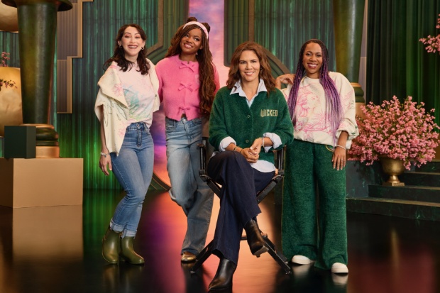 Group of young women wearing Wicked: For Good x Katie Kime clothing