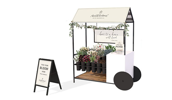 A rendering of the flower cart and sign with flowers inside