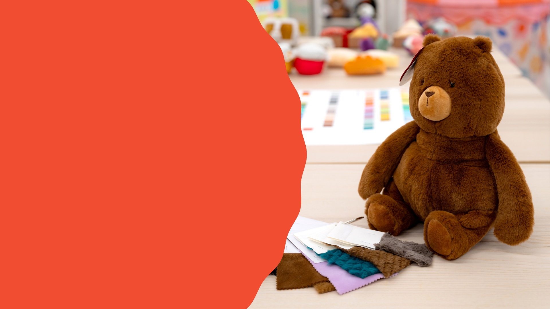 A Gigglescape paper showing the brand’s color schemes next to a plush bear.