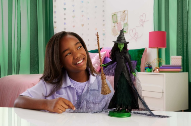Elphaba doll with young girl