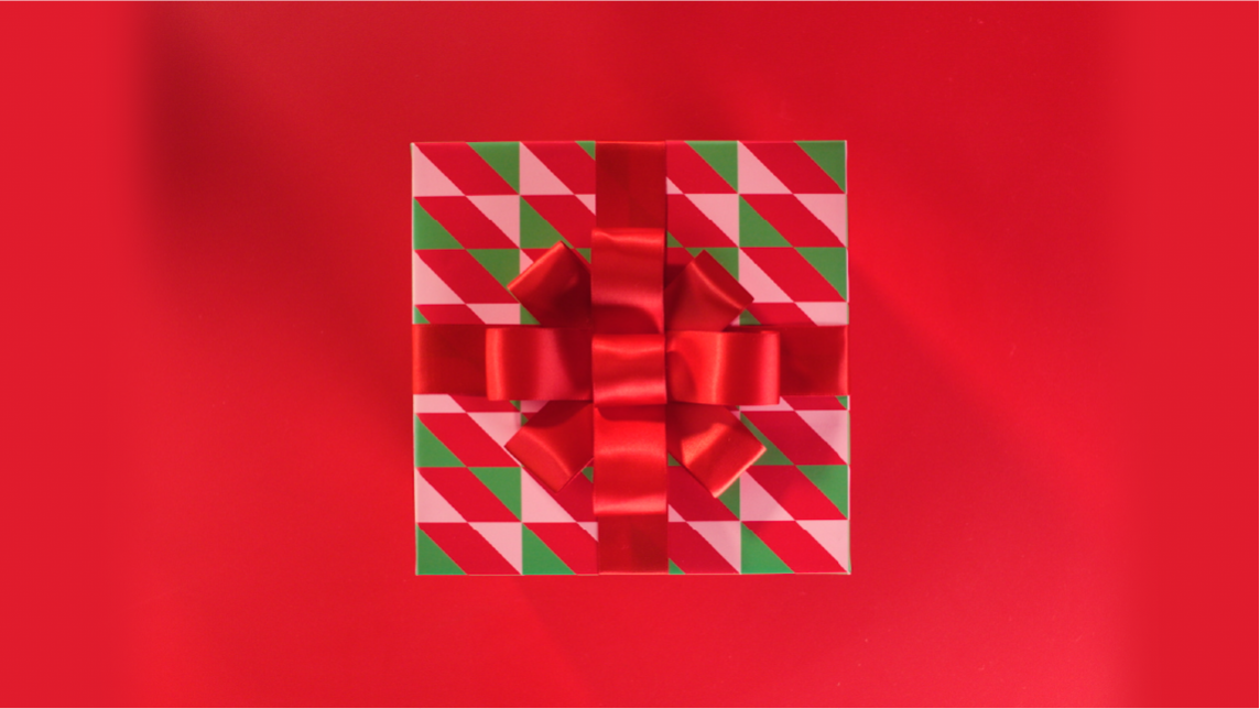 A red graphic with a wrapped present in the center.