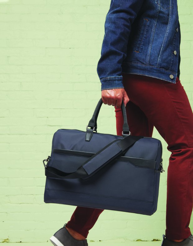 a person holding a bag