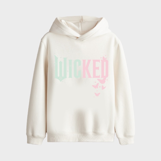 An adult’s cream Wicked pullover sweatshirt, part of the Paul Tazewell for Target collection.