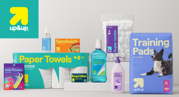 The up&up logo in the top left corner and a variety of up&up products including kids’ flossers, paper towels, sandwich bags, ibuprofen, body lotion, dog training pads and cotton balls.