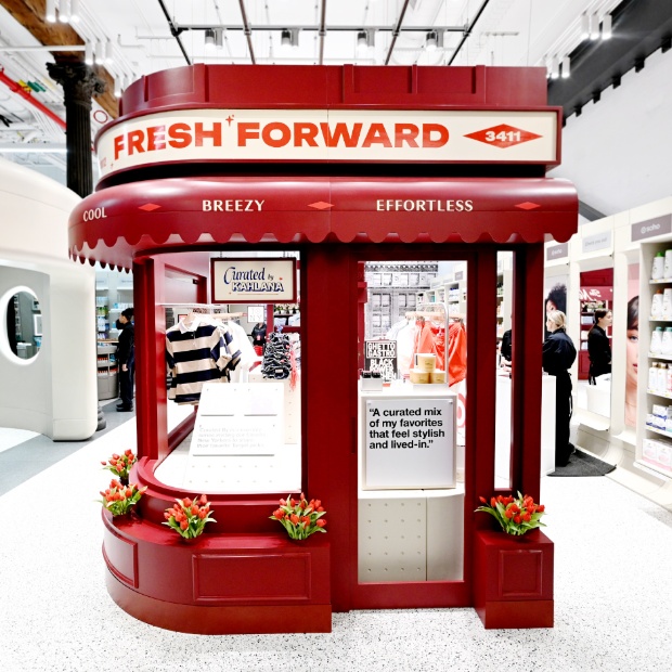 A red storefront display in Target SoHo with signage that says Fresh Forward, Breezy and Effortless across the top.