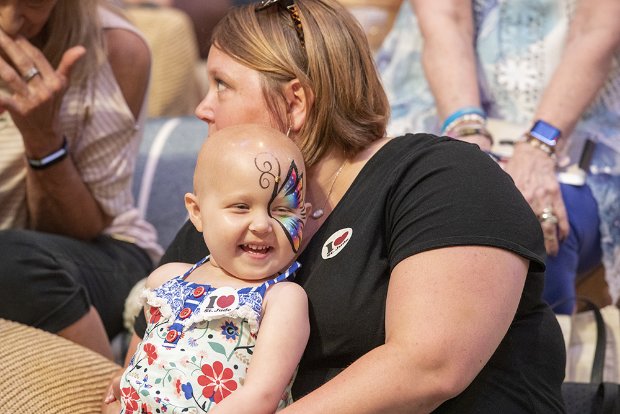 a person holding a baby