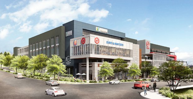 a building with cars parked in front