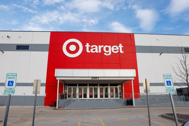 An image shows the front entrance of a Target flow center.