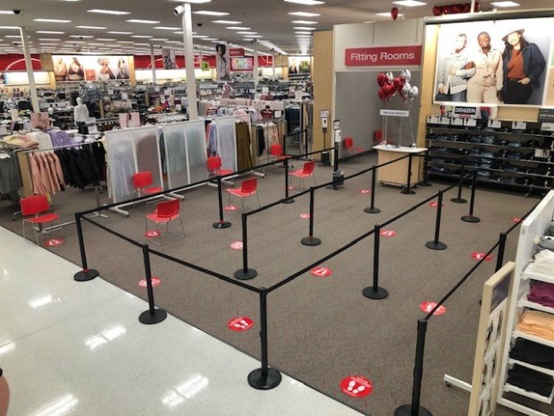 a large room with a pool table and chairs