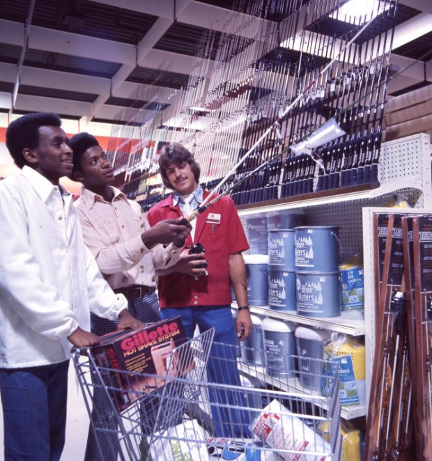 a group of men in a warehouse