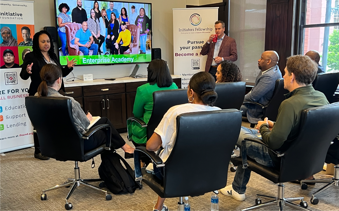 A Hometown Foundation recipient presents to a group of people.
